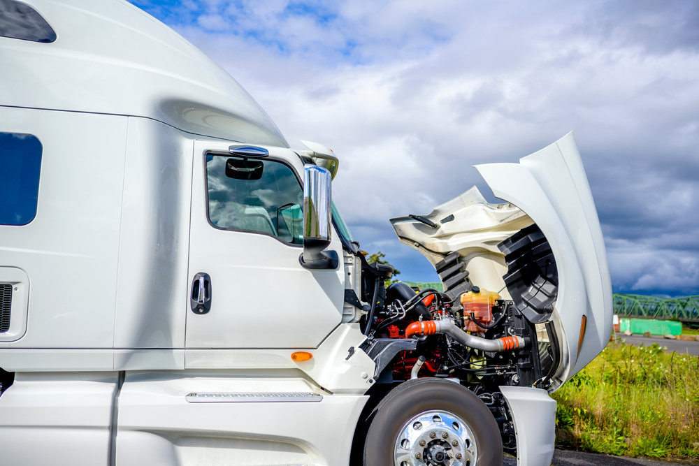 Broken,big,rig,industrial,professional,white,semi,truck,with,open